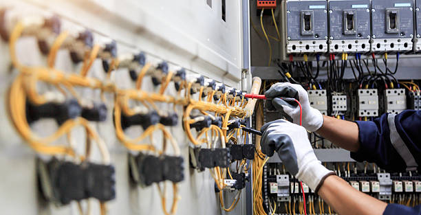 Professional Electrician technician working in Navarre Beach, FL